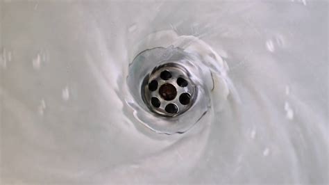 Water Swirling Down Drain Hole Of Stainless Stock Footage Sbv 346754540