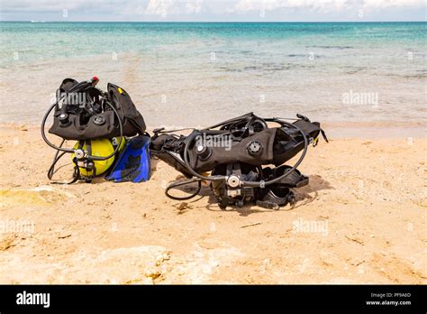 Equipment Of A Scuba Diver An Oxygen Balloon Lies On The Beach Diving