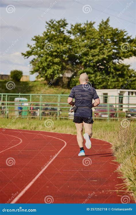 Man Running On A Running Track Stock Photo Image Of Athletic Healthy