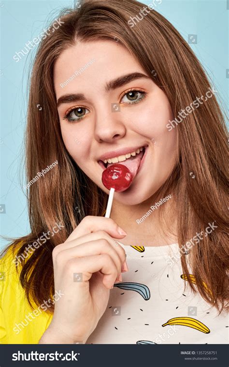 Girl Blonde Chupa Chups On Blue Stock Photo Shutterstock