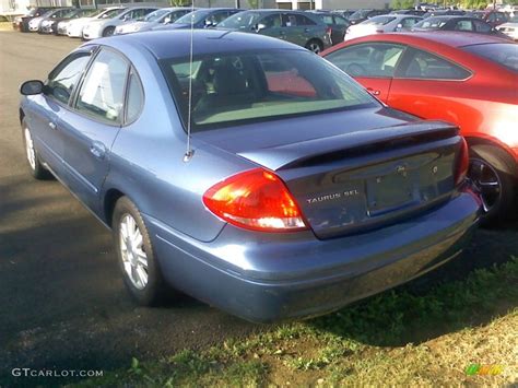 True Blue Metallic 2004 Ford Taurus SEL Sedan Exterior Photo 52159432