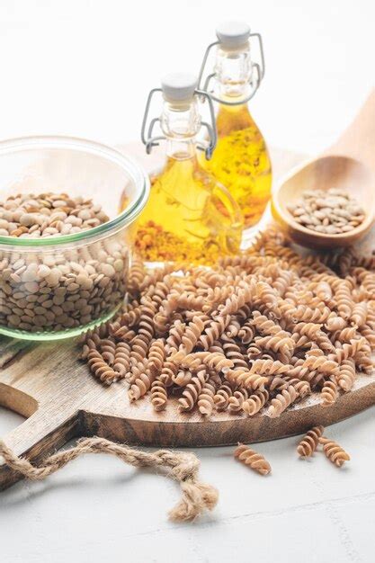 Premium Photo Green Lentil Fusilli Pasta On A Gray Concrete Background