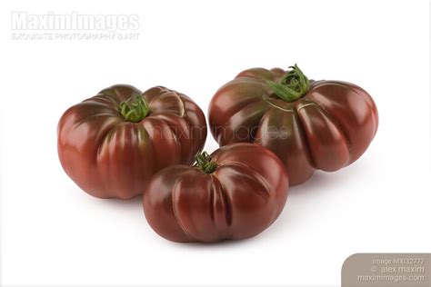 Photo Of Three Dark Red Organic Heirloom Tomatoes Black Krim Or Crimean