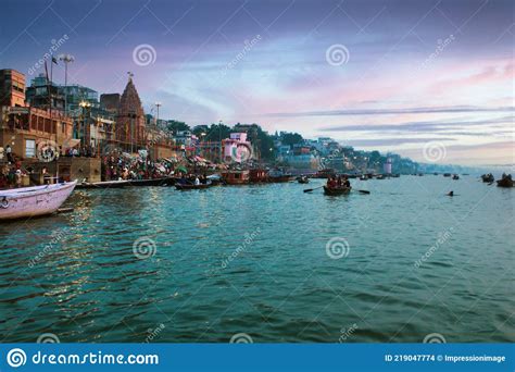 Varanasi India People And Tourists On Wooden Boat Sightseeing In