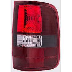 Dorman Halogen Tail Light Assembly Passenger Side Plastic Clear Red