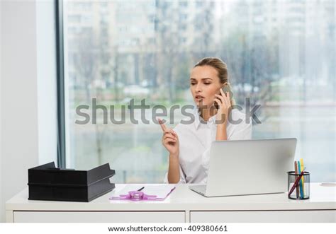 Blonde Woman Behind Her Desk Working Stock Photo Shutterstock