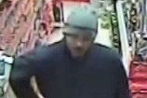 Terrifying Moment Robber Holds Kitchen Knife To Throat Of Shopkeeper In