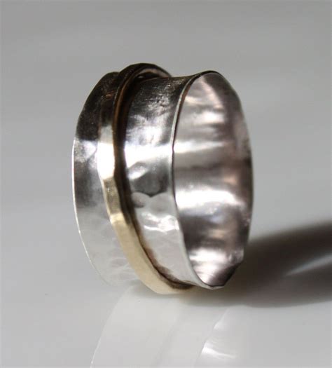 Hammered Silver And Brass Spinner Ring Etsy Gemstones Jewelry Rings