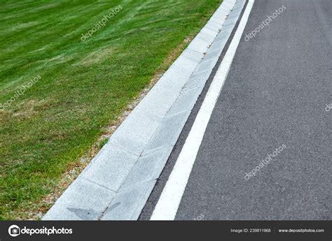 Street Gutter Stormwater Drainage System Side Road Markings Grass Stock