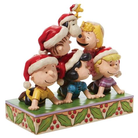 Charlie Brown Snoopy And Peanuts Cast In A Holiday Pyramid Jim Shore