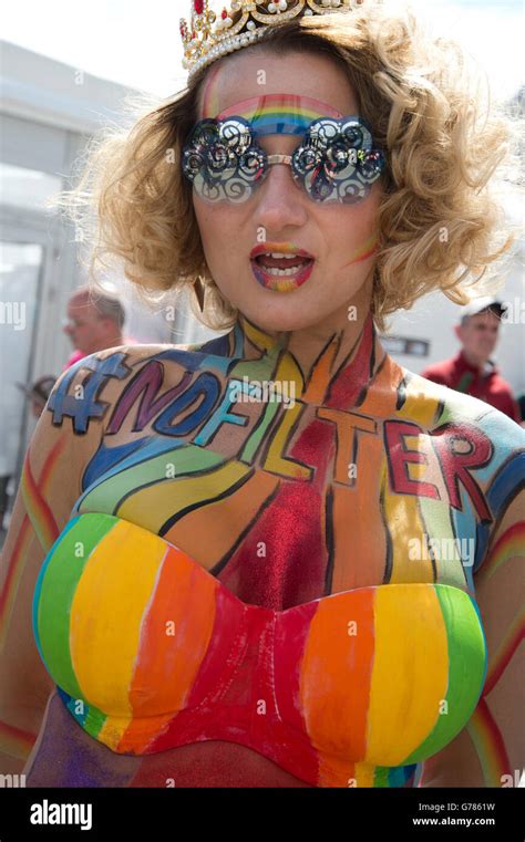 Pride In London Trafalgar Square A Woman With Rainbow Body Paint And Bikini Top Saying