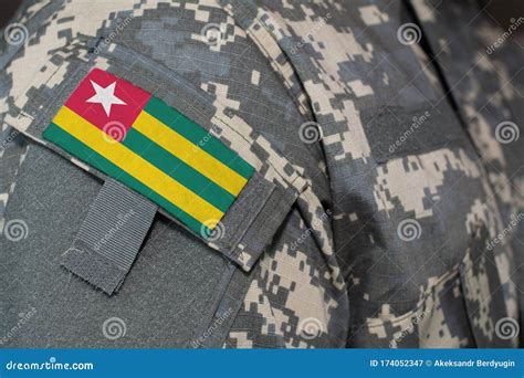 Togo Army Uniform Patch Flag on Soldiers Arm. Military Concept Stock Image - Image of safety ...