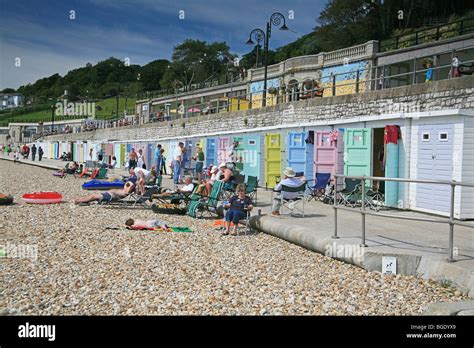 Colourful Beach Huts On The Sea Front At Lyme Regis Dorset England