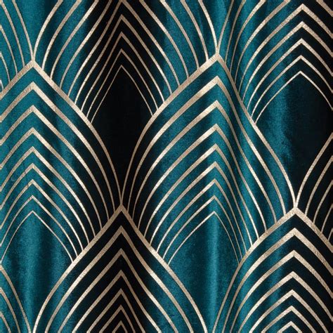 A Blue And Gold Curtain With An Art Deco Design On The Bottom In Front