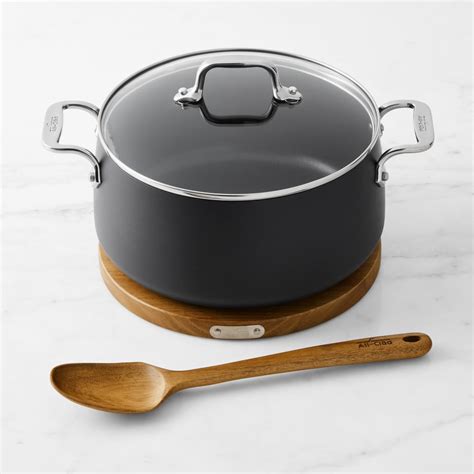 All Clad Ha1 Hard Anodised Non Stick Dutch Oven With Wooden Trivet And Spoon Williams Sonoma Au