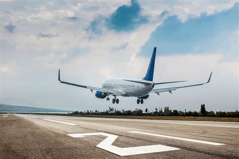 Passenger Airplane Landing Stock Photo Download Image Now Istock