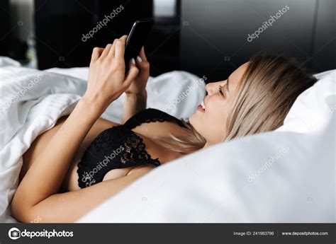 Portrait Seductive Woman 20S Wearing Luxury Lingerie Lying Bed White Stock Photo