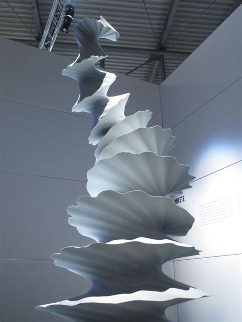 An Abstract Sculpture Is Hanging From The Ceiling