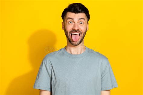 Portrait Photo Of Young Funky Man Bristle Brunet Stick Out Tongue