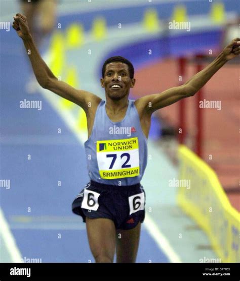 Ethiopia S Haile Gebrselassie Celebrates A World Record In The 2 Mile As He Crosses The Line