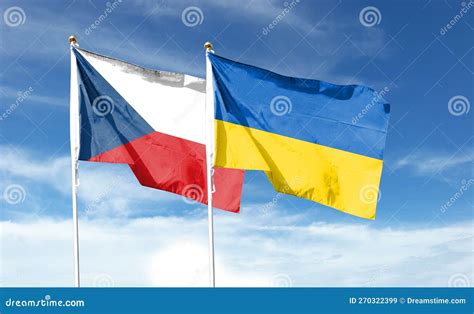 Ukrainian Flag And Czech Flag On Cloudy Sky Waving In The Sky Stock