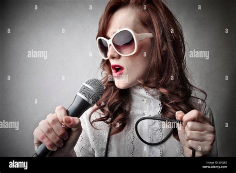 Brunette Woman Singing Stock Photo Alamy