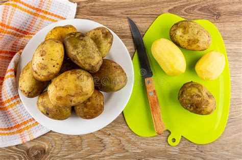 Napkin Raw Potatoes In Plate Unpeeled Potatoes Knife Peeled Potato