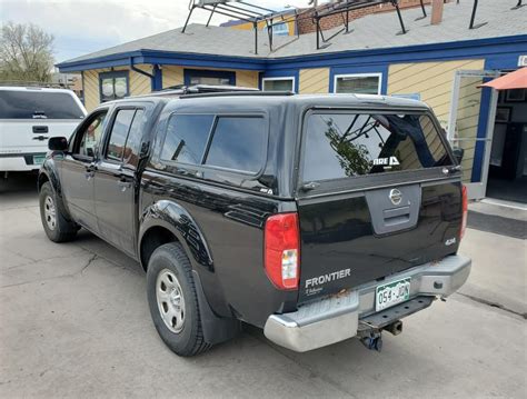 Nissan Frontier With ARE Series V Camper Shell With The 44 OFF