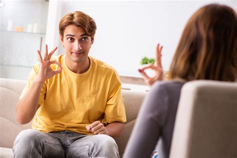 Sign Language Translator In Orlando Woman And Man Learning Sign