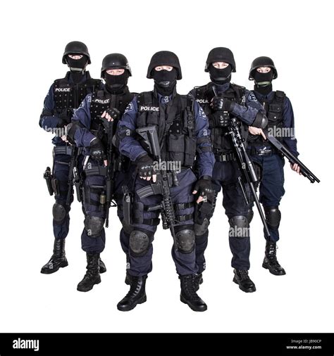 Special Weapons And Tactics Swat Team Officers With Guns Stock Photo