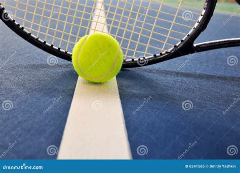 Tennis Ball And Racquet On A Court Line Stock Image Image Of Green