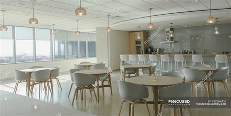 Tables And Chairs In Modern Office Cafeteria — Nobody Inside Stock