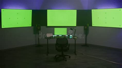 Computer And Monitors With Green Screen In Color Correction Studio