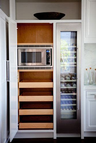 Microwave Built In To Tall Cabinet With Roll Outs Below Kitchen