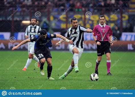 Fabio Quagliarella And Cristian Chivu In Action During The Match