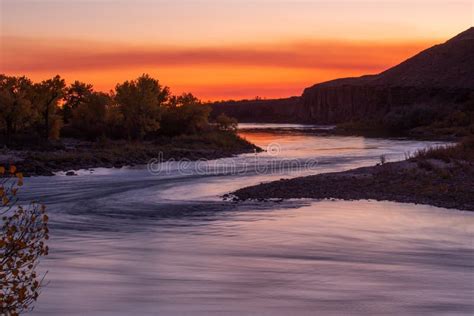 River Winding through the Landscape during Sunset Stock Image - Image ...