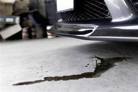 Car Leaking Red Fluid Front Passenger Side