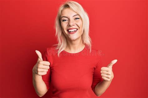 Young Blonde Girl Wearing Casual Clothes Success Sign Doing Positive