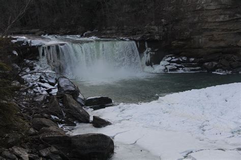 Winter time at Cumberland Falls, frozen foam below the falls ...