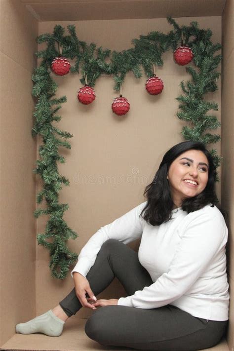Year Old Latina Woman Inside A Cardboard Box Decorated As A Gift To Celebrate Christmas And