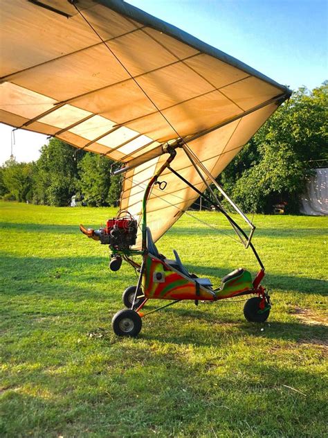 Vertical Shot of an Ultralight Trike Parked on a Meadow Outdoors Stock ...