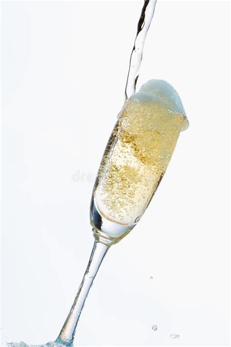 White Wine Splashing Out Of Glass Isolated On White Background Stock