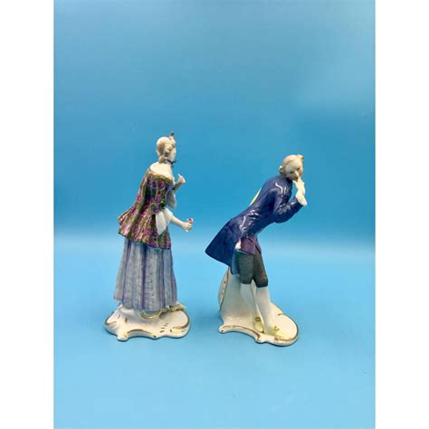 PAIR OF NYMPHENBURG GERMAN PORCELAIN FIGURINES