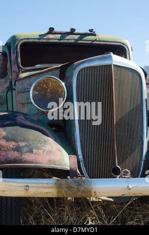 An Old Antique Truck Rusts Slowly In A Mountain Field It S Grille And