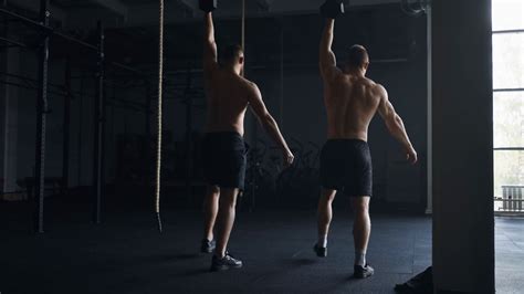 Pair Of Sportsmen With Naked Muscular Torso Stock Footage SBV 347752793