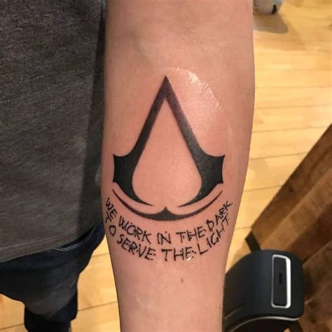 101 Amazing Assassins Creed Tattoo Designs You Need To See Assassins Creed Tattoo Tattoos