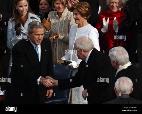 Vice President Dick Cheney Right Shakes Hands With President George W