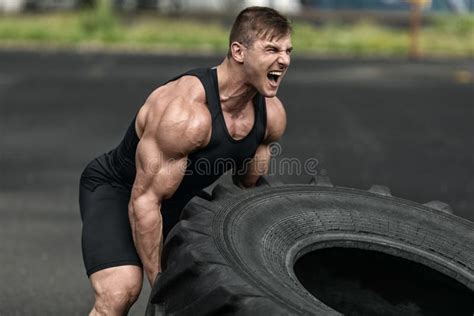 Muscular Man Working Out In Gym Doing Push Ups Exercises Strong Male Naked Torso Abs Stock