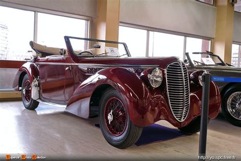 An Antique Car Is Parked In A Building