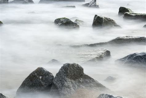 Ocean Mist Seascape Of Water Rushing Through Rocks Stock Image Image